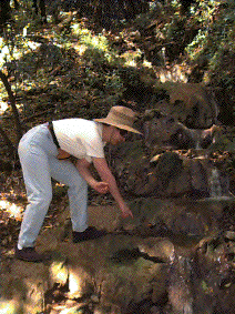 Kathy measures water temperature